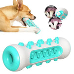 Puppy chewing a rubber dog dental chew toy for teething